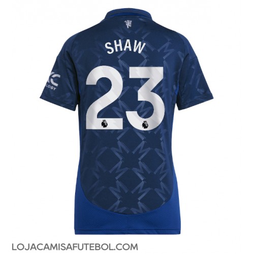 Camisa de Futebol Manchester United Luke Shaw #23 Equipamento Secundário Mulheres 2024-25 Manga Curta